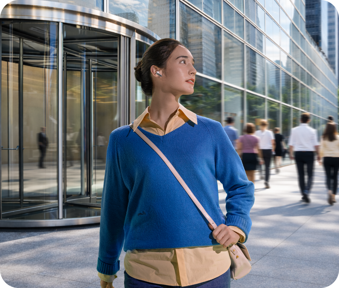 A women wearing soundbuds in public